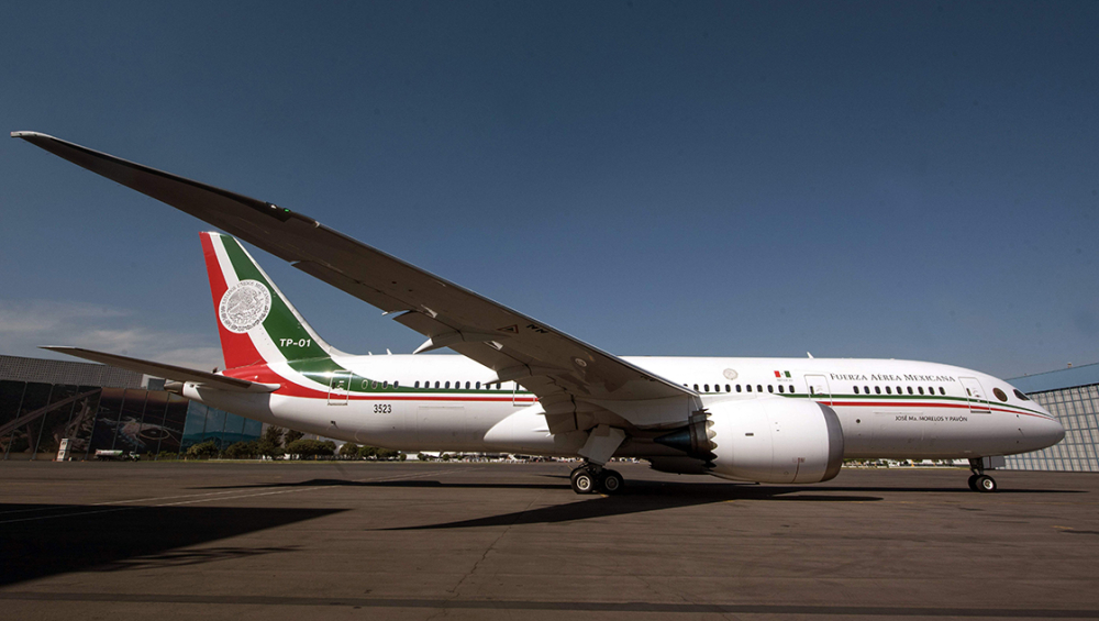 View of Mexico's presidential airplane -a Boeing 787-8 with a cost of 125.4 million dollars- after its last fly at the  Benito Juarez International Airport, in Mexico City on December 3, 2018. - Anti-establishment leftist new President Andres Manuel Lopez Obrador announced that he will sell the presidential plane to a private company in the United States. (Photo by ALEJANDRO MELENDEZ / AFP)