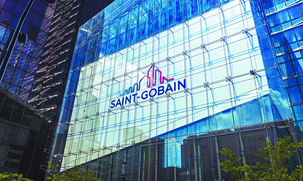 Paris, France - May 2022 : Saint-Gobain logo on the front of the headquarters building of the French company in La Defense, Paris