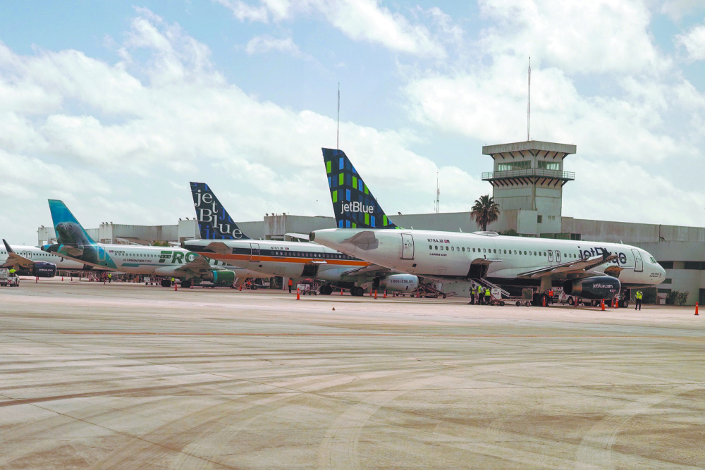 CANCUN, MEXICO - JULY 3, 2021: JetBlue Airways plane on tarmac at Cancun International Airport. JetBlue Airways is a major American low cost airline, and the seventh largest airline in North America