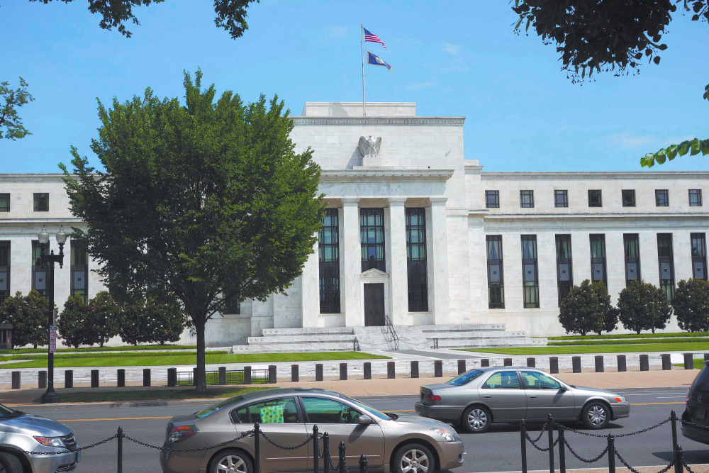 (FILES) This file photo taken on August 1, 2015 shows the US Federal Reserve building is seen in Washington, DC. Markets were already focusing more on what might happen in June as the Federal Reserve opened its two-day monetary policy meeting April 26, 2016 with no expectations of an interest rate change. With Chair Janet Yellen having tilted the Federal Open Market Committee to the dovish side in its March review, and the US economy in a lull, analysts say the group has room to wait and see what happens in the coming months. / AFP PHOTO / KAREN BLEIER