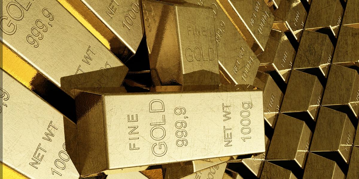 Oro cae 1% por alza del dólar