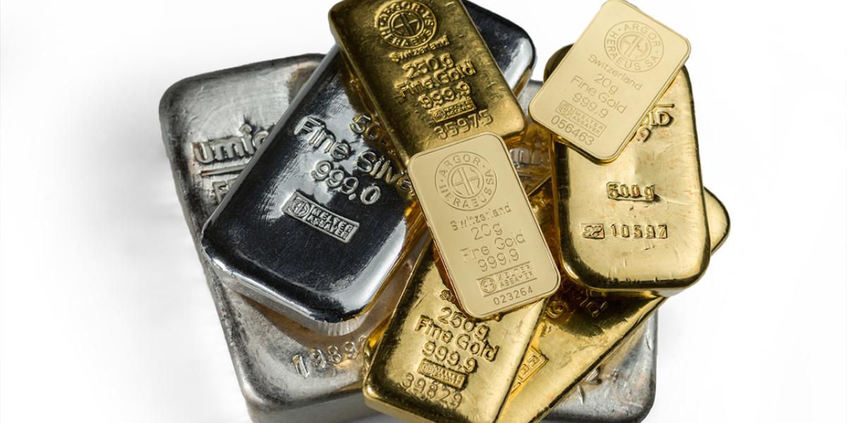 Precio del oro cae por alza del dólar