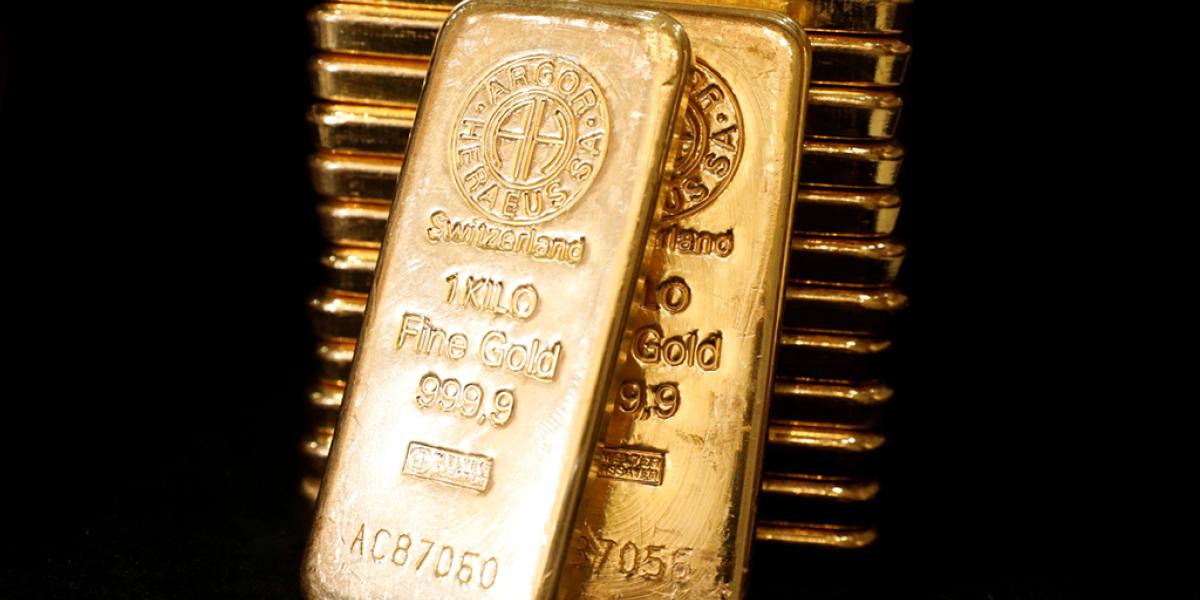El oro supera la barrera de los 1,800 dólares por onza por primera vez ...