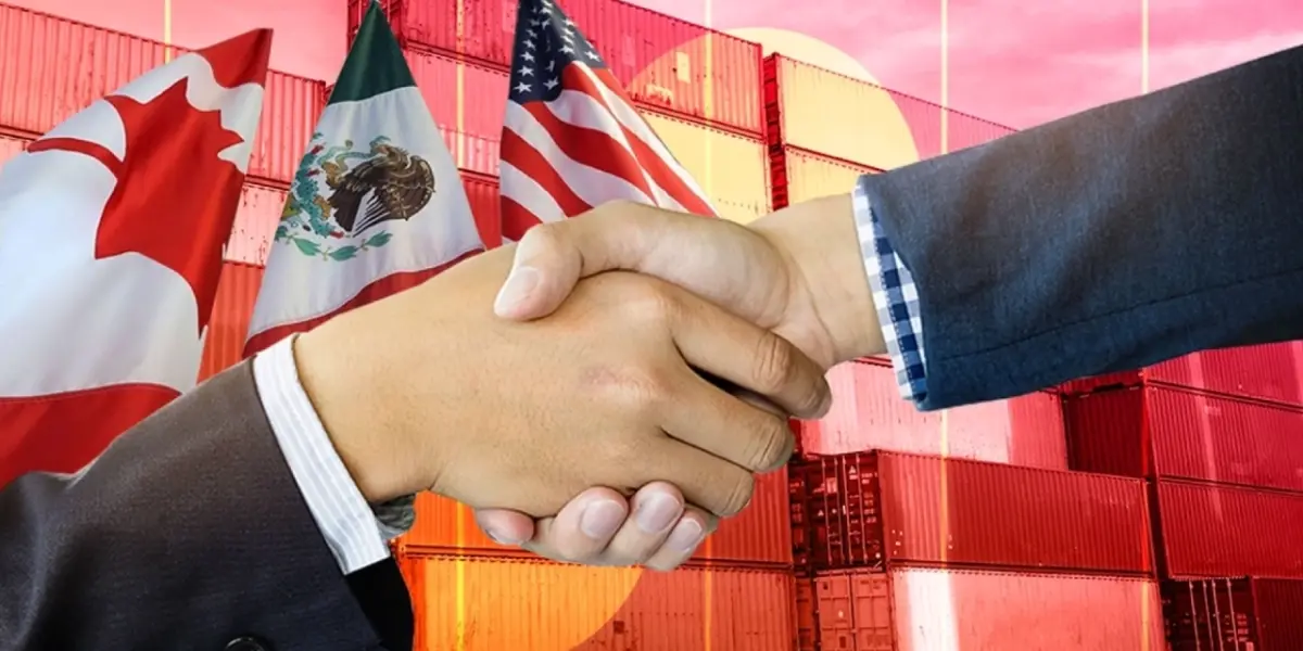Apretón de manos entre dos personas con banderas de Canadá, México y Estados Unidos frente a contenedores de carga.