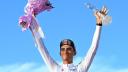UAE Team Emirates' Isaac Del Toro celebrates on the podium after winning the Giro d'Italia white jersey.