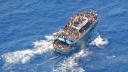 migrantes a bordo de una ambarcación antes de que volcara en alta mar, frente a Grecia, el 14 de junio de 2023.  Foto: Guardia Costera Helénica vía Reuters