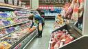 A woman buys charcuterie at a supermarket in Buenos Aires on May 23, 2024. - Argentina's economic activity continued to plummet in March, with the construction and manufacturing industries leading the slowdown as President Javier Milei's government slashes spending, official figures showed Wednesday. (Photo by STRINGER / AFP)