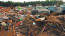 Nearly a month after severe flooding, damaged cars are placed together on the outskirts of the town in Paiporta, Valencia, Spain, November 28, 2024. REUTERS/Eva Manez