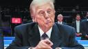 U.S. President Donald Trump reacts as he signs an executive order during the inaugural parade inside Capital One Arena on the inauguration day of his second presidential term, in Washington, U.S. January 20, 2025. REUTERS/Carlos Barria