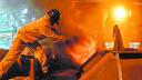 (FILES) In this file photo taken on June 25, 2001 a worker at a blast furnace of the Compania Siderurgica Paulista (Cosipa), burns part of the 140 tons of repossesed drugs, in Cubatao, 80 km south of Sao Paulo, Brazil. - President Jair Bolsonaro on Monday said he would appeal to US President Donald Trump to show understanding towards Brazil in a looming row over fresh steel and aluminum tariffs.Trump announced earlier he would reinstate tariffs on steel and aluminum from Brazil and Argentina after currency depreciations made their exports to the United States more competitive. (Photo by MAURICIO LIMA / AFP)