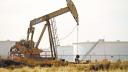 A pump jack operates near a crude oil reserve in the Permian Basin oil field near Midland, Texas, U.S. February 18, 2025.  REUTERS/Eli Hartman