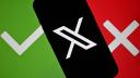This illustration photograph shows Elon Musk's X (formerly Twitter) logo displayed on a smartphone, as a tablet screen displays a green and a red tag in Toulouse, southwestern France on January 20, 2025. (Photo by Lionel BONAVENTURE / AFP)