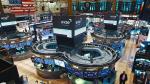 Traders work on the trading floor at the New York Stock Exchange (NYSE) in New York City