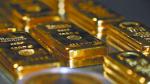 FILE PHOTO: Gold bars and coins are stacked in the safe deposit boxes room of the Pro Aurum gold house in Munich, Germany,  August 14, 2019. REUTERS/Michael Dalder/File Photo-NARCH/NARCH30 NARCH/NARCH30