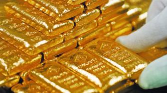 FILE PHOTO: An employee sorts gold bars in the Austrian Gold and Silver Separating Plant  in Vienna, Austria, December 15, 2017.  REUTERS/Leonhard Foeger/File Photo-NARCH/NARCH30