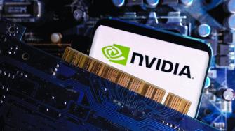 FILE PHOTO: A smartphone with a displayed NVIDIA logo is placed on a computer motherboard in this illustration taken March 6, 2023. REUTERS/Dado Ruvic/Illustration/File Photo