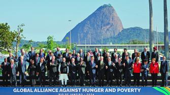 Leaders attending the launch of the Global Alliance Against Hunger and Poverty pose for a group photo after the first session of the G20 Leaders' Meeting in Rio de Janeiro, Brazil, on November 18, 2024. (Photo by Ludovic MARIN / AFP)