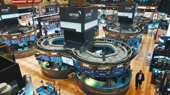 Traders work on the trading floor at the New York Stock Exchange (NYSE) in New York City, U.S., January 25, 2023. REUTERS/Andrew Kelly