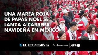 Una marea roja de entusiastas corredores vestidos de Papá Noel se lanzaron a las calles el domingo en los suburbios de la ciudad mexicana de Guadalajara (oeste) en una singular carrera de Navidad.