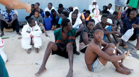 Migrants arrive at a naval base after they were rescued by Libyan coastal guards in Tripoli - Migrants arrive at a naval base after they were rescued by Libyan coastal guards in Tripoli, Libya November 6, 2017. REUTERS/Ahmed Jadallah