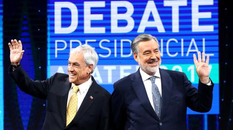 Chilean presidential candidates Alejandro Guillier and Sebastian Pinera attend a live televised debate in Santiago, - Chilean presidential candidates Alejandro Guillier and Sebastian Pinera attend a live televised debate in Santiago, Chile December 11, 2017. REUTERS/Ivan Alvarado