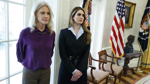 Hope Hicks,Kellyanne Conway - White House Communications Director Hope Hicks, right, stands with White House senior adviser Kellyanne Conway during a meeting in the Oval Office between President Donald Trump and Shane Bouvet, Friday, Feb. 9, 2018, in Washington. (AP Photo/Evan Vucci)