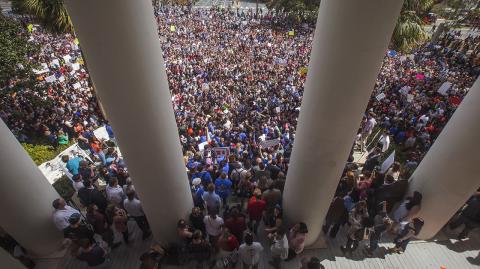 Rally for Gun Reform - Protesters rally against gun violence on the steps of the old Florida Capitol in Tallahassee, Fla., Wednesday, Feb 21, 2018. Students at schools across Broward and Miami-Dade counties in South Florida planned short walkouts Wednesday, the one week anniversary of the deadly shooting at Marjory Stoneman Douglas High School.  (AP Photo/Mark Wallheiser)