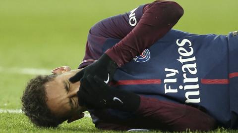 FILE PHOTO: Ligue 1 - Paris St Germain vs Olympique de Marseille - FILE PHOTO: Soccer Football - Ligue 1 - Paris St Germain vs Olympique de Marseille - Parc des Princes, Paris, France - February 25, 2018   Paris Saint-Germainâ€™s Neymar lies on the pitch after sustaining an injury  Picture taken February 25, 2018.  REUTERS/Stephane Mahe/File Photo - NARCH/NARCH30