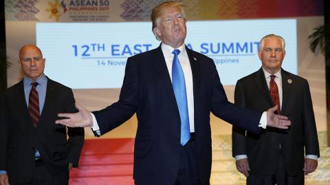 FILE PHOTO: U.S. President Trump makes remarks to the media as he stands alongside U.S. National Security Advisor H.R. McMaster and U.S. Secretary of State Tillerson at the 12th East Asia Summit in Manila - FILE PHOTO: U.S. President Donald Trump makes remarks to the media as he stands alongside U.S. National Security Advisor H.R. McMaster (L) and U.S. Secretary of State Rex Tillerson at the 12th East Asia Summit in Manila, Philippines November 14, 2017.  REUTERS/Jonathan Ernst/File Photo - NARCH/NARCH30