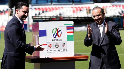 Yon de Luisa gestures next to Alfonso Navarrete Prida during the presentation of the government guarantees for the tri-nation North American bid to host the 2026 World Cup at Azteca stadium in Mexico City - Yon de Luisa, Director of the joint bid by Mexico, United States and Canada for the FIFA World Cup 2026 gestures next to Alfonso Navarrete Prida, Interior Minister, during the presentation of the government guarantees for the tri-nation North American bid to host the 2026 World Cup at Azteca stadium in Mexico City, Mexico February 16, 2018. REUTERS/Carlos Jasso