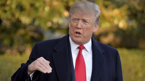 FILE PHOTO: U.S. President Donald Trump responds to a reporter's question as he departs the White House, Washington, DC, U.S. - FILE PHOTO: U.S. President Donald Trump responds to a reporter's question about North Korea as he departs the White House, Washington, DC, U.S., for a day trip to suburban Pittsburgh, Pennsylvania, for a Make America Great Again rally supporting Republican candidate Rick Saccone, March 10, 2018.           REUTERS/Mike Theiler/File Photo - NARCH/NARCH30