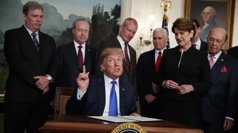 Donald Trump - President Donald Trump speaks before he signs a presidential memorandum imposing tariffs and investment restrictions on China in the Diplomatic Reception Room of the White House, Thursday, March 22, 2018, in Washington. (AP Photo/Evan Vucci)