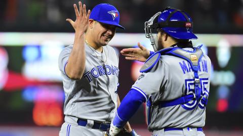 MLB: Toronto Blue Jays at Baltimore Orioles - Apr 10, 2018; Baltimore, MD, USA; Toronto Blue Jays pitcher Roberto Osuna (54) celebrates with catcher Russell Martin (55) after beating the Baltimore Orioles 2-1 at Oriole Park at Camden Yards. Mandatory Credit: Evan Habeeb-USA TODAY Sports