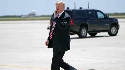 Donald Trump - President Donald Trump walks across the tarmac to greet members of the military and their families upon his arrival at Naval Air Station Key West on Air Force One in Key West, Fla., Thursday, April 19, 2018.(AP Photo/Pablo Martinez Monsivais)