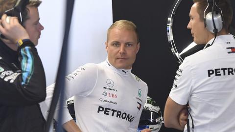 Mercedes driver Valtteri Bottas, of Finland, gets ready for the first practice session at the Formula One Canadian Grand Prix auto race in Montreal, Friday, June 8, 2018. (Ryan Remiorz/The Canadian Press via AP) - MANDATORY CREDIT