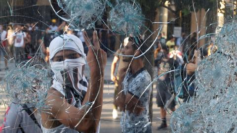 A demonstrator gestures during a protest in Beirut