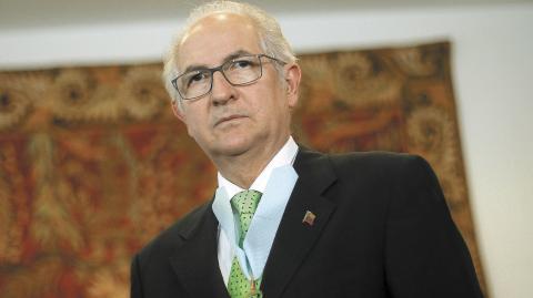 Venezuelan exiled veteran opposition figure and former mayor of Caracas Antonio Ledezma wears an Order Medal Of Cruzeiro Do Sul after receiving it form Brazil