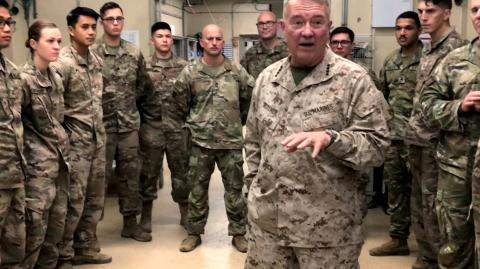 FILE PHOTO: Marine General Kenneth McKenzie speaks with U.S. troops while visiting Forward Operating Base Fenty in Jalalabad, Afghanistan