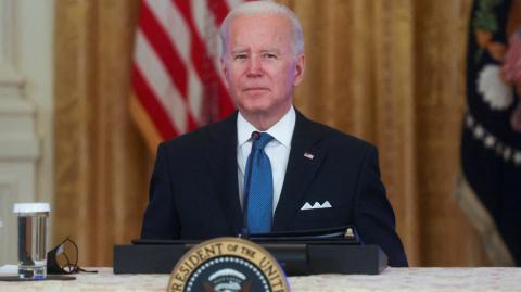 U.S. President Joe Biden listens to a question from Fox News reporter Peter Doocy