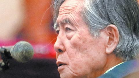 FILE PHOTO: Former President of Peru Alberto Fujimori attends a trial as a witness at the navy base in Callao