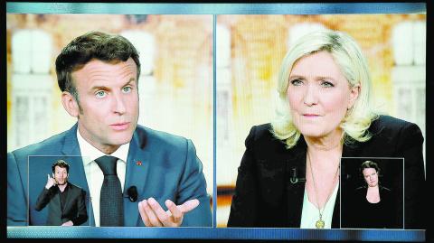 El mandatario centrista Emmanuel Macron y la ultraderechista Marine Le Pen. Foto: Reuters.