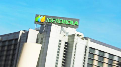 The logo of Spanish power company Iberdrola is seen on top of Iberdrola