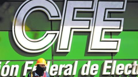 The logo of Mexico's state-run electric utility known as the Federal Electricity Commission (CFE), is pictured at its building office in Monterrey, Mexico February 9, 2021. REUTERS/Daniel Becerril