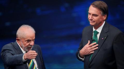 Former Brazil's President and presidential candidate Luiz Inacio Lula da Silva and Brazil's President and candidate for re-election Jair Bolsonaro speak during a Presidential Debate ahead of the runoff election, in Sao Paulo, Brazil, October 16, 2022. REUTERS/Mariana Greif