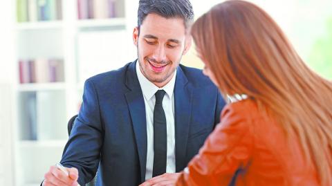 Woman,Meeting,Financial,Adviser,In,Office