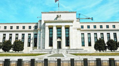 FILE PHOTO: The Federal Reserve Board building on Constitution Avenue is pictured in Washington, U.S., March 27, 2019. REUTERS/Brendan McDermid/File Photo-NARCH/NARCH30 NARCH/NARCH30