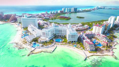 View of beautiful Hotels in the hotel zone of Cancun at sunset. Riviera Maya region in Quintana roo on Yucatan Peninsula