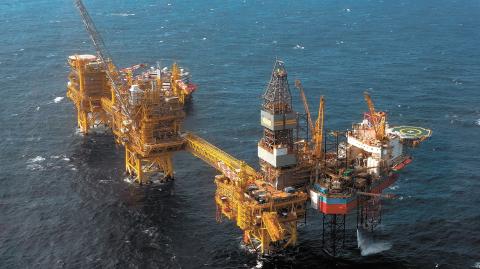 The Total Culzean platform is pictured on the North Sea, about 45 miles (70 kilometres) east of the Aberdeen, Europe's self-proclaimed oil capital on Scotland's northeast coast, on April 8, 2019. - Deep beneath the cold waters of the North Sea lies what French energy giant Total hopes will help feed Britain's voracious appetite for gas.  Total forecasts that the Culzean field, located more than 15,000 metres under the seabed halfway between Scotland and Norway, will cover five percent of Britain's gas requirements. (Photo by ANDY BUCHANAN / AFP) / TO GO WITH AFP STORY by Joseph SOTINEL-TO GO WITH AFP STORY by Joseph SOTINEL