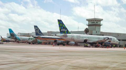 CANCUN, MEXICO - JULY 3, 2021: JetBlue Airways plane on tarmac at Cancun International Airport. JetBlue Airways is a major American low cost airline, and the seventh largest airline in North America