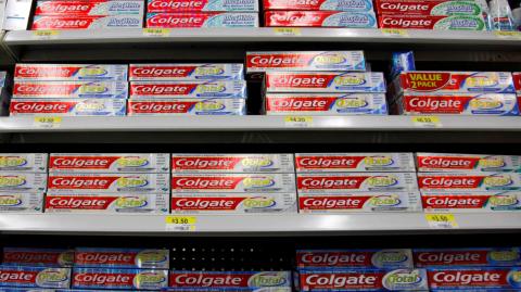 FILE PHOTO: Boxes of Colgate toothpaste are displayed on store shelves in Westminster